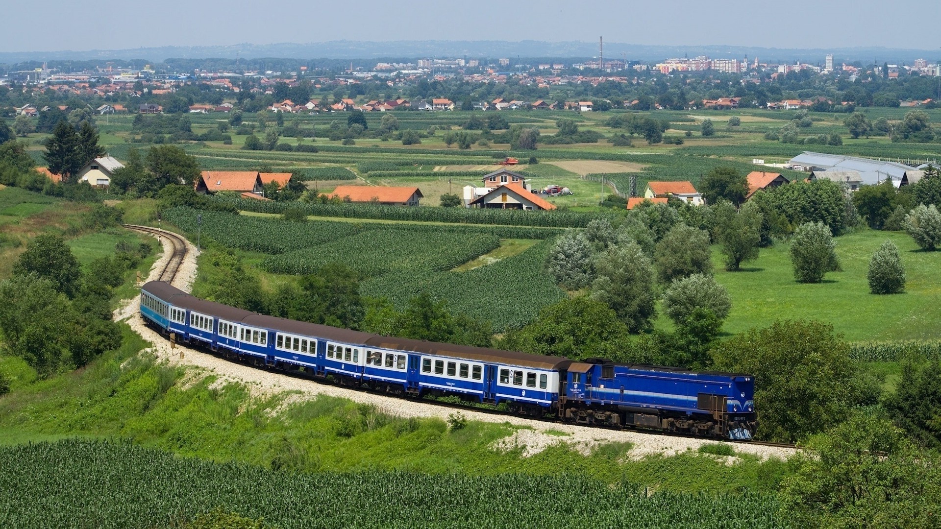 1920x1080 wallpapers: train, structure, blue, fields, summer, outskirts, railway, from above, distance, city (image)