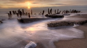 stakes, shore, foam, sunset - wallpapers, picture