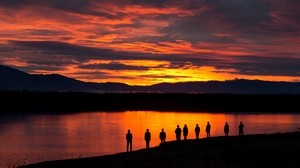 people, silhouettes, sunset, lake, mountains