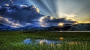 the sun, rays, clouds, mountains, swamp, reeds, the sky